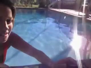 teen at the pool showing her big boobs in cam